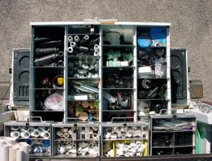 organized irrigation equipment on a truck