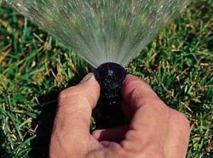 tech performing sprinkler repair in Rocklin CA